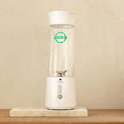 Soma Portable Blender on a wooden shelf, designed for making premium quality ceremonial cacao anywhere.