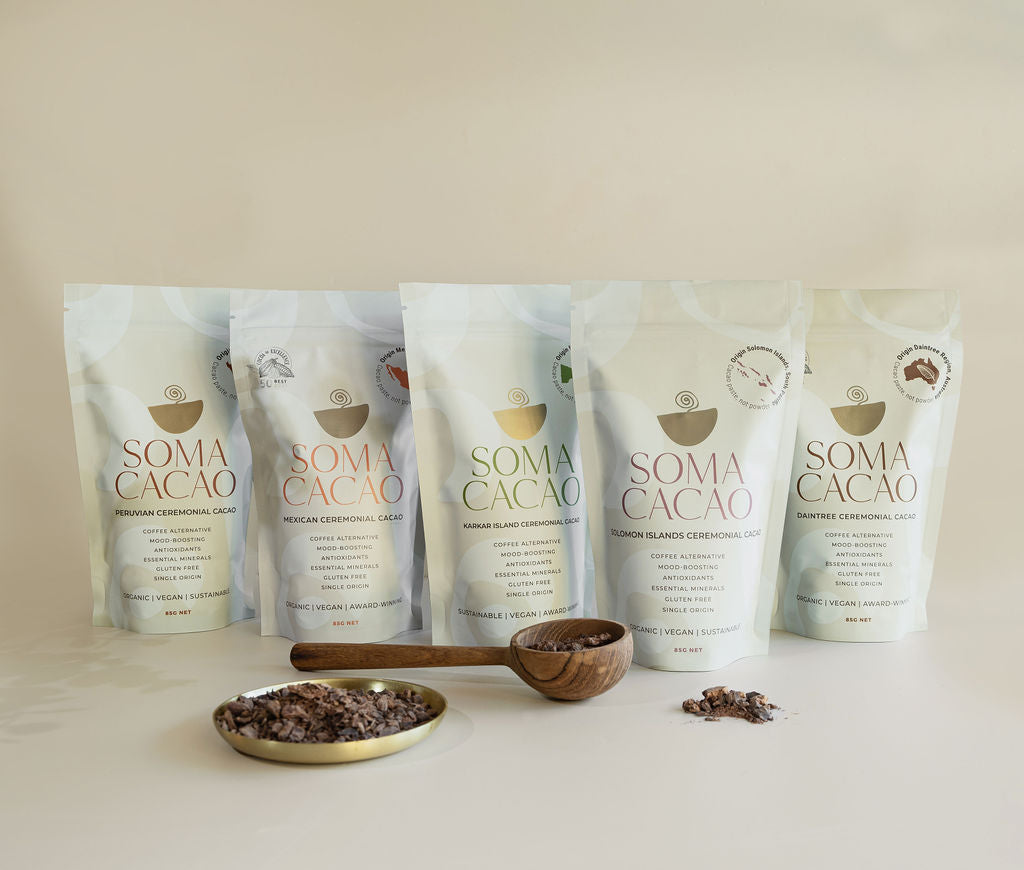 Ceremonial Cacao starter packs featuring five varieties with a wooden scoop and cacao nibs.