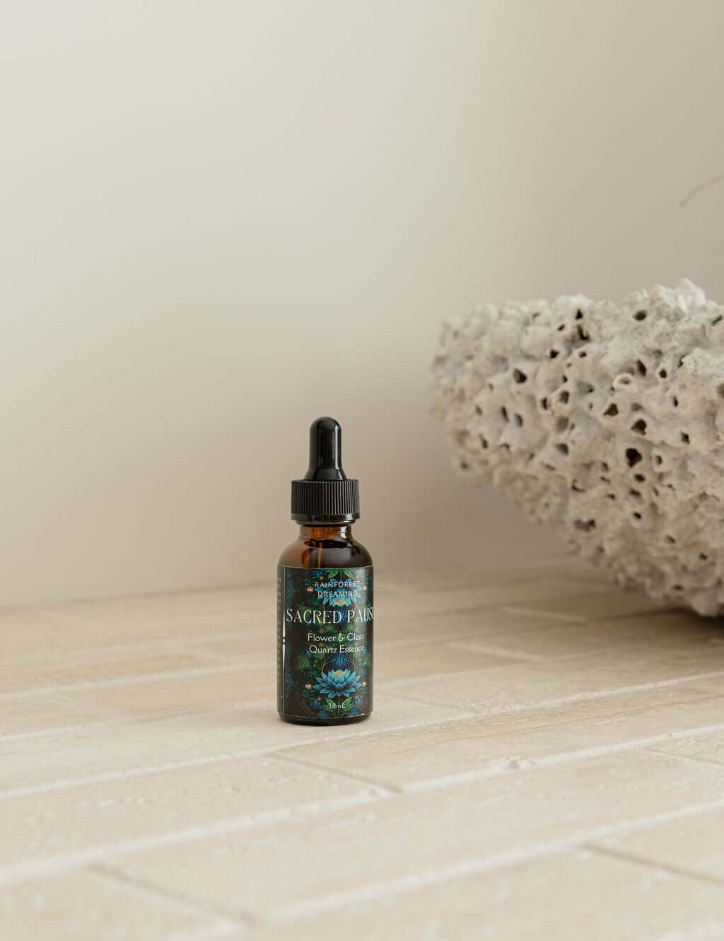 Blue Lotus Flower Essence in an amber dropper bottle, showcasing premium quality for relaxation and well-being.